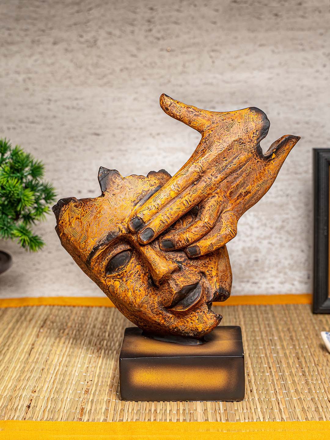 

TIED RIBBONS Gold-Toned Human Face Statue Showpiece
