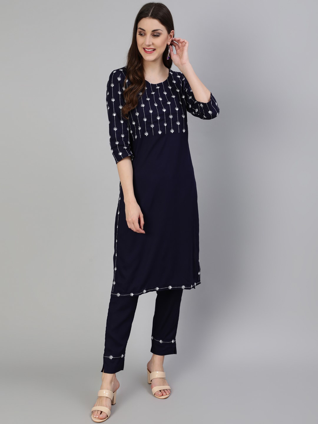 

antaran Women Navy Blue Ethnic Motifs Yoke Design Empire Kurta with Trousers