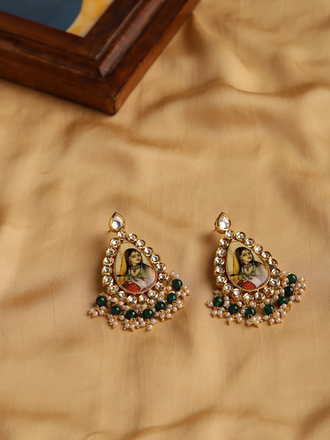 

Ruby Raang Gold-Plated Classic Kundan Studded Chandbalis Earrings