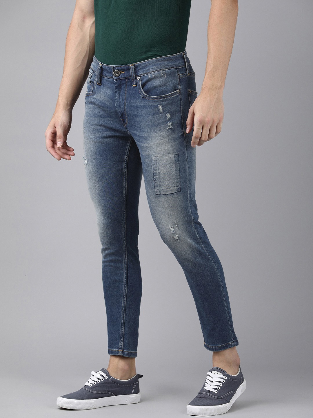 

Voi Jeans Men Blue Cropped Skinny Fit Low Distress Light Fade Stretchable Jeans