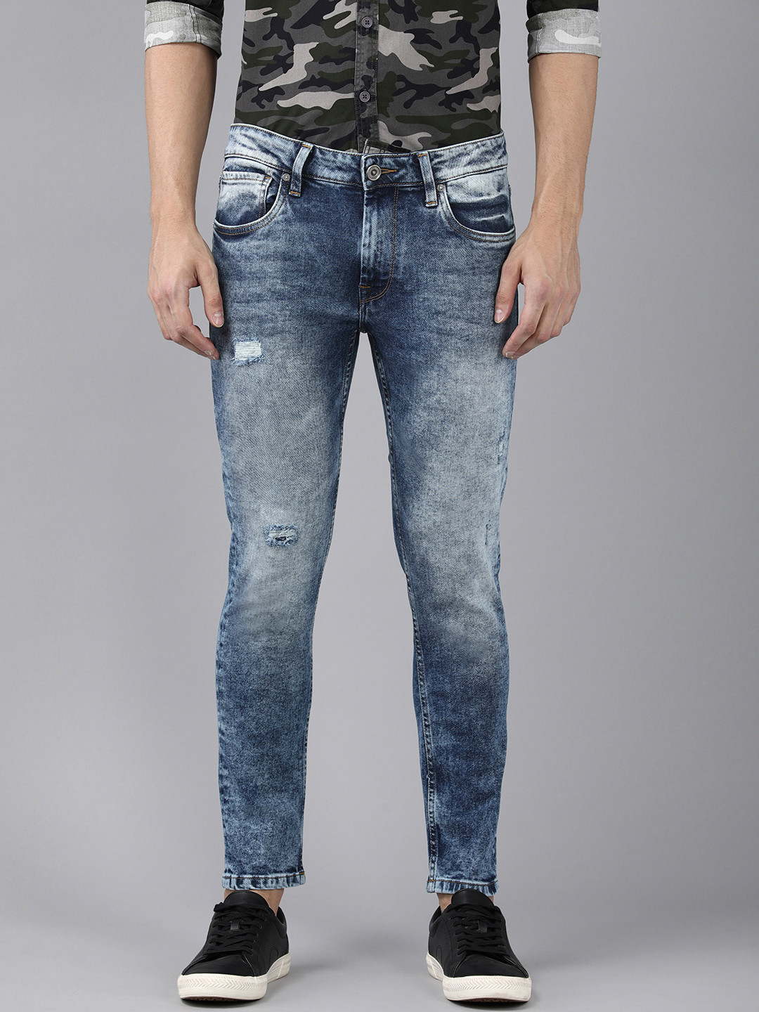 

Voi Jeans Men Blue Skinny Fit Highly Distressed Light Fade Stretchable Jeans