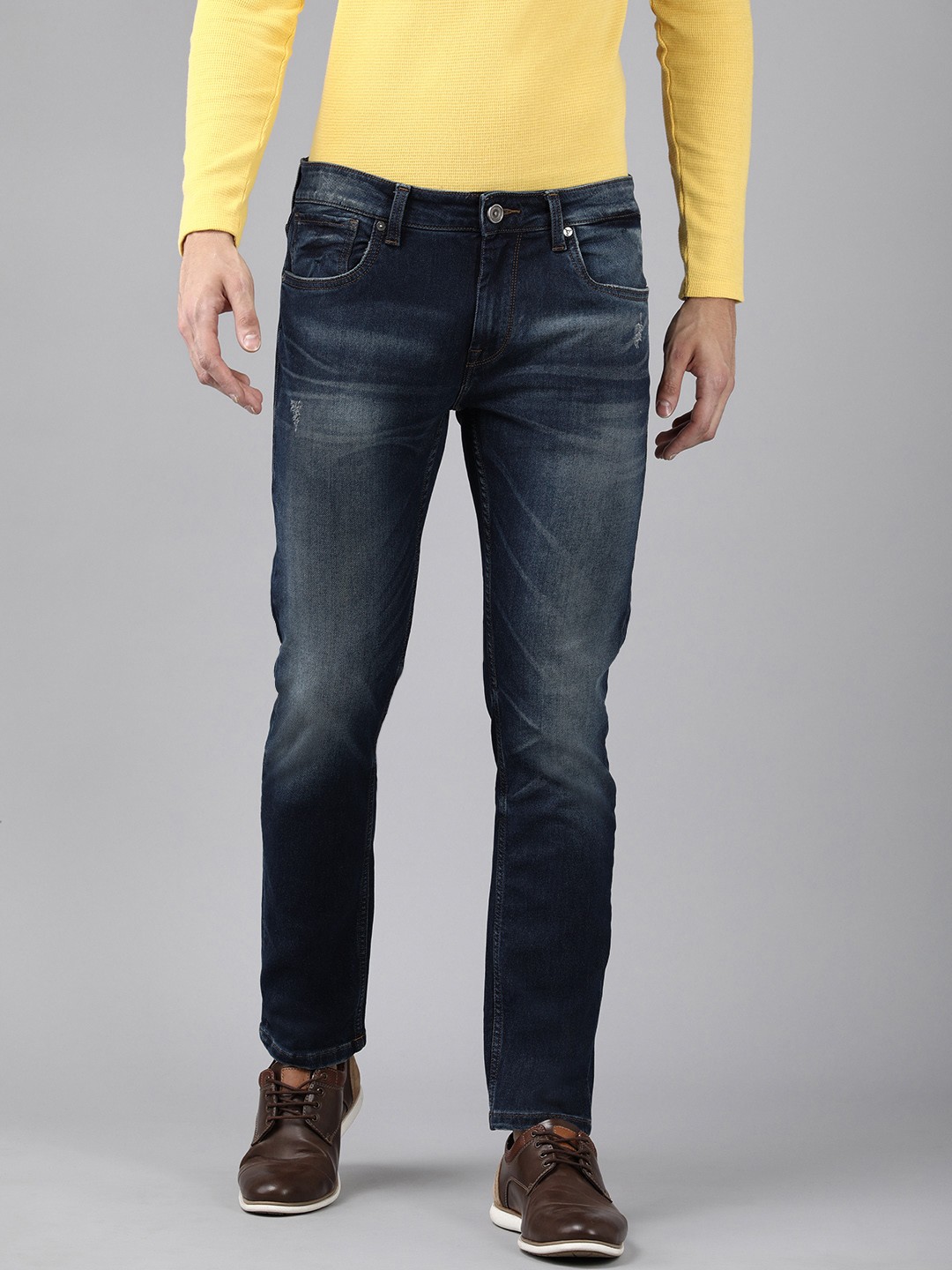 

Voi Jeans Men Navy Blue Skinny Fit Mildly Distressed Light Fade Stretchable Jeans