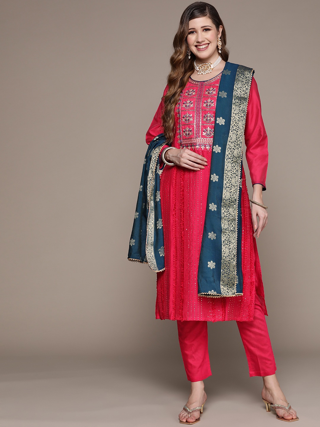 

Ishin Women Coral Red Ethnic Motifs Embroidered Gotta Patti Kurta with Trousers & Dupatta
