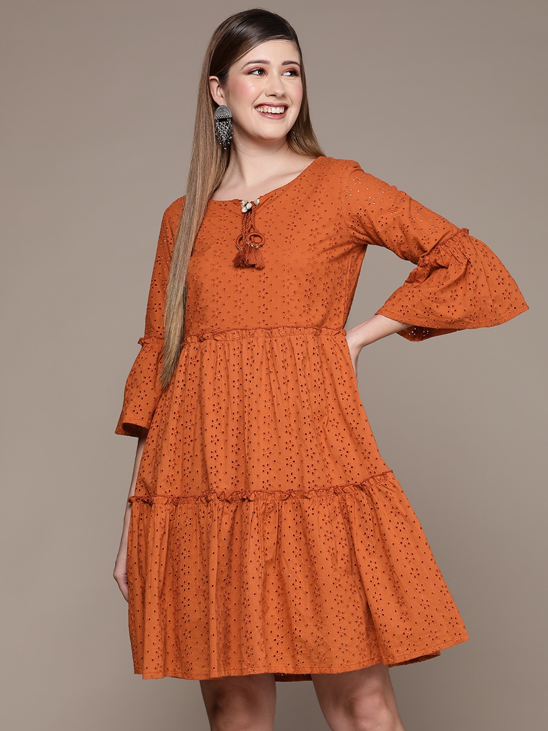 

Ishin Women Orange Schiffli Pure Cotton Tiered Empire Dress