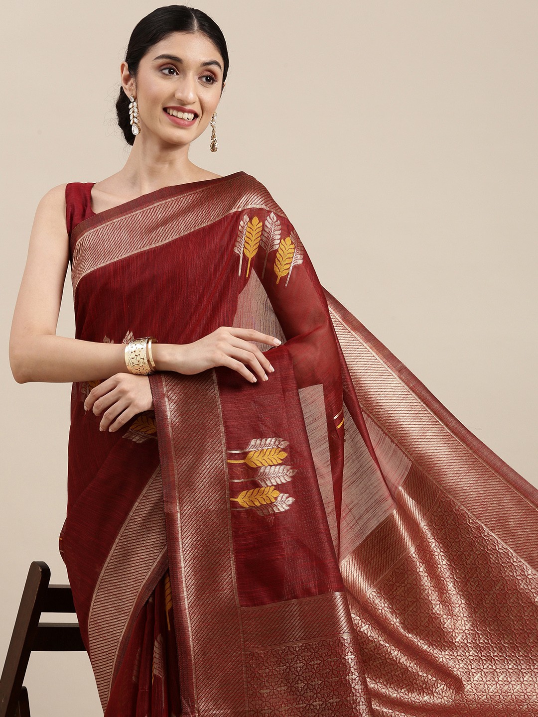 

Mitera Maroon & Golden Ethnic Design Linen Blend Banarasi Saree