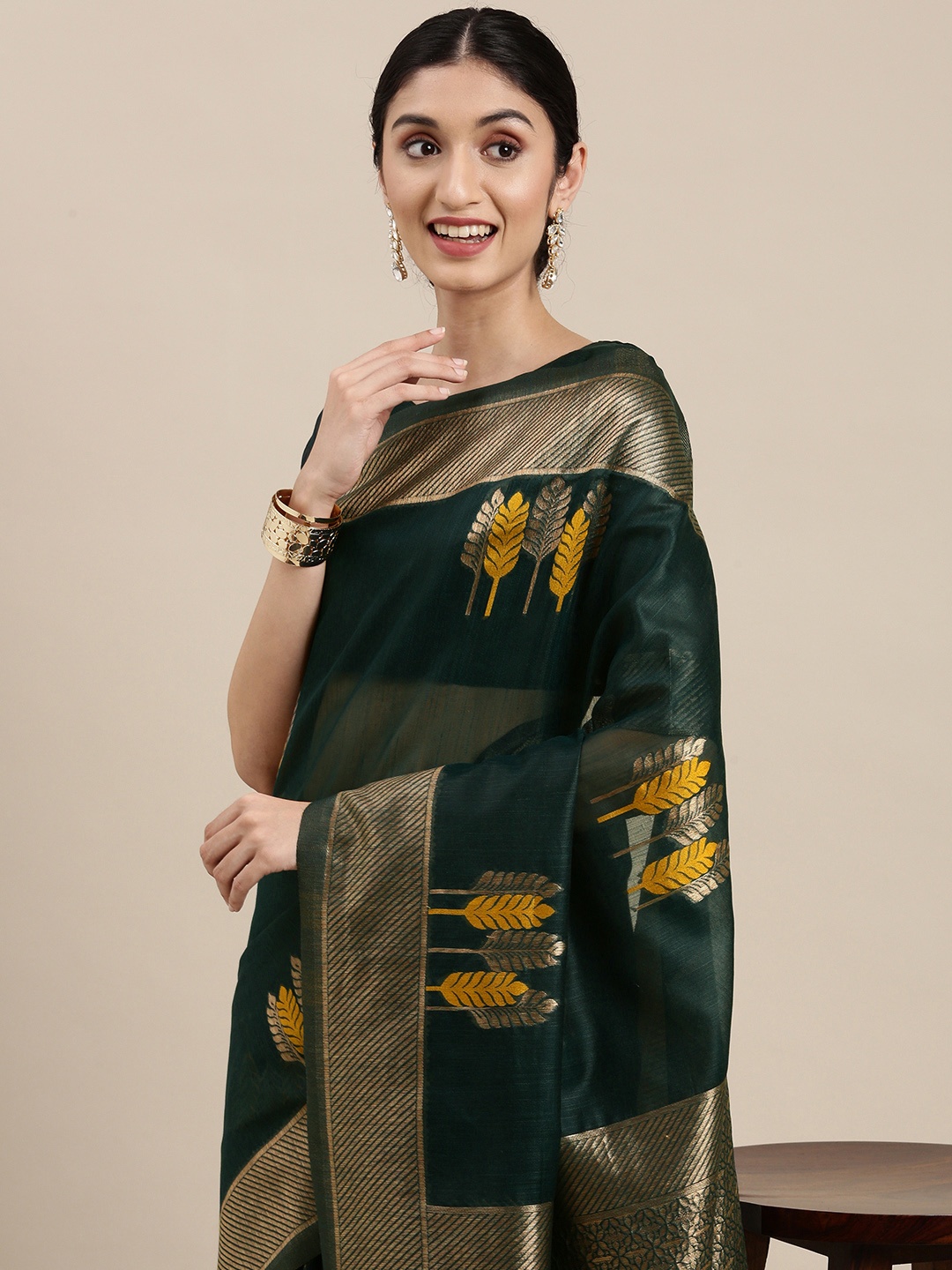 

Mitera Green & Golden Ethnic Design Linen Blend Banarasi Saree