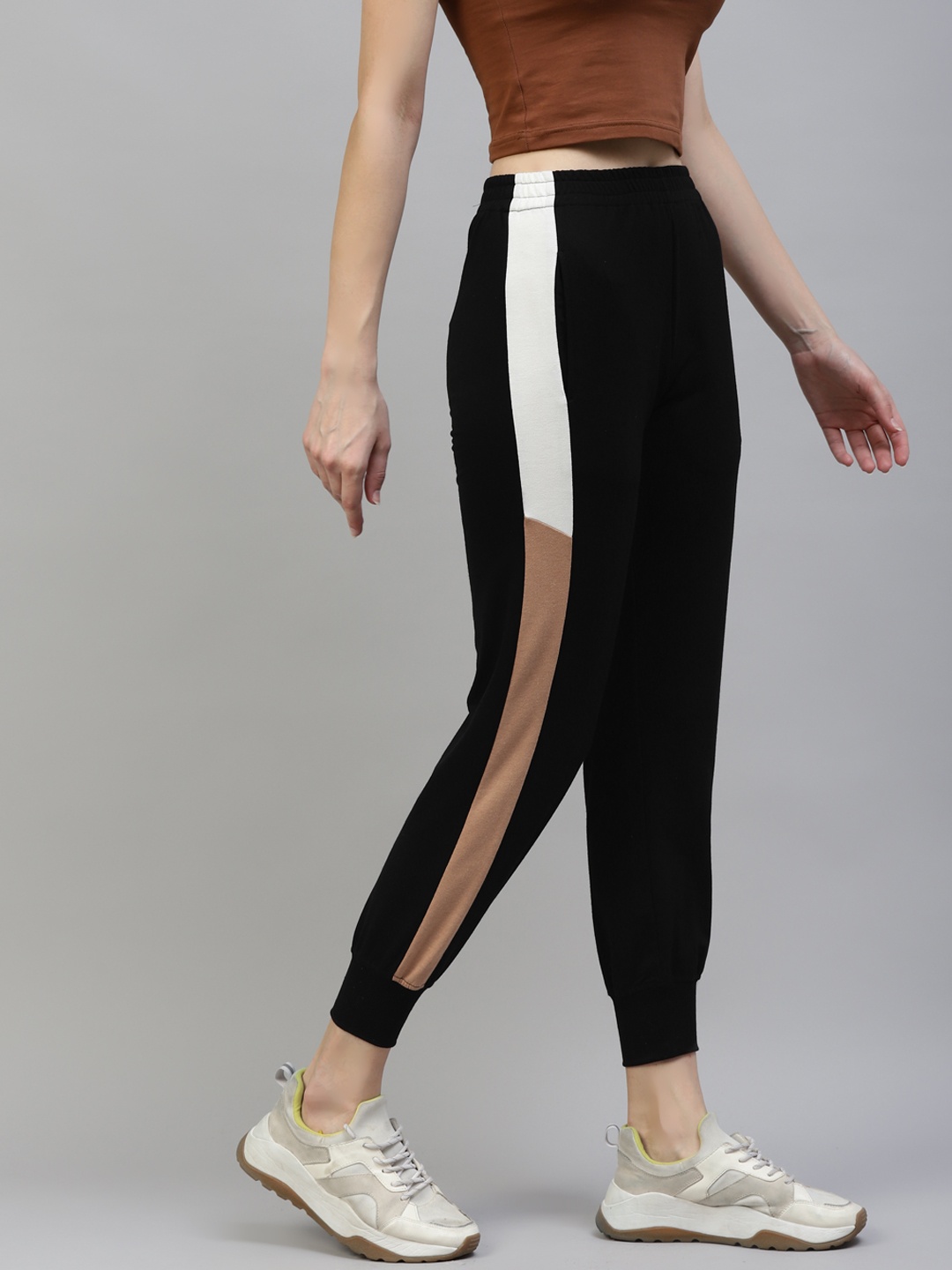 

Laabha Women Black & White Solid Joggers with Side Taping Detail