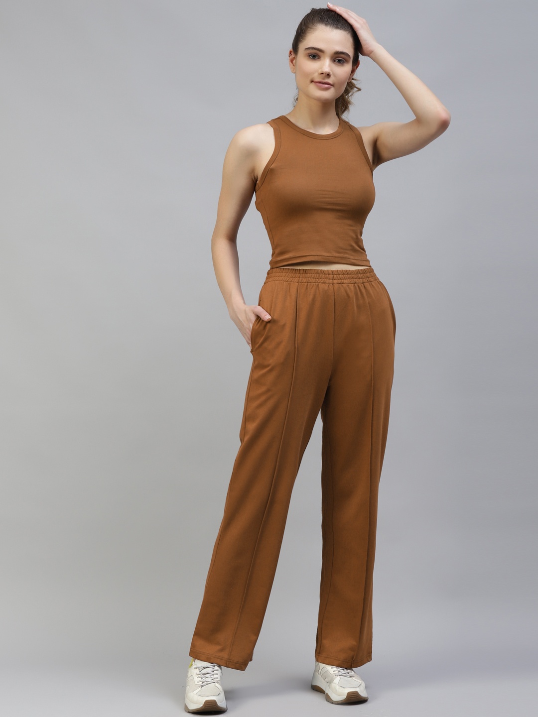 

Laabha Women Rust Brown Solid Tracksuit