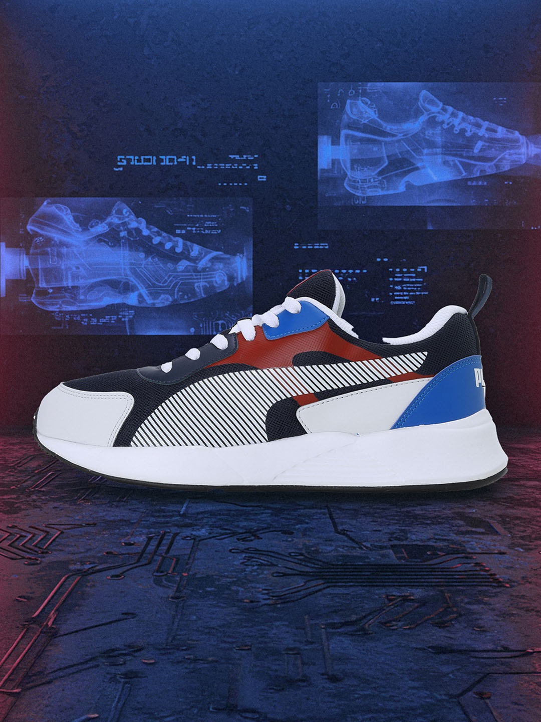 

Puma Men Navy Blue and White Colourblocked Sneakers