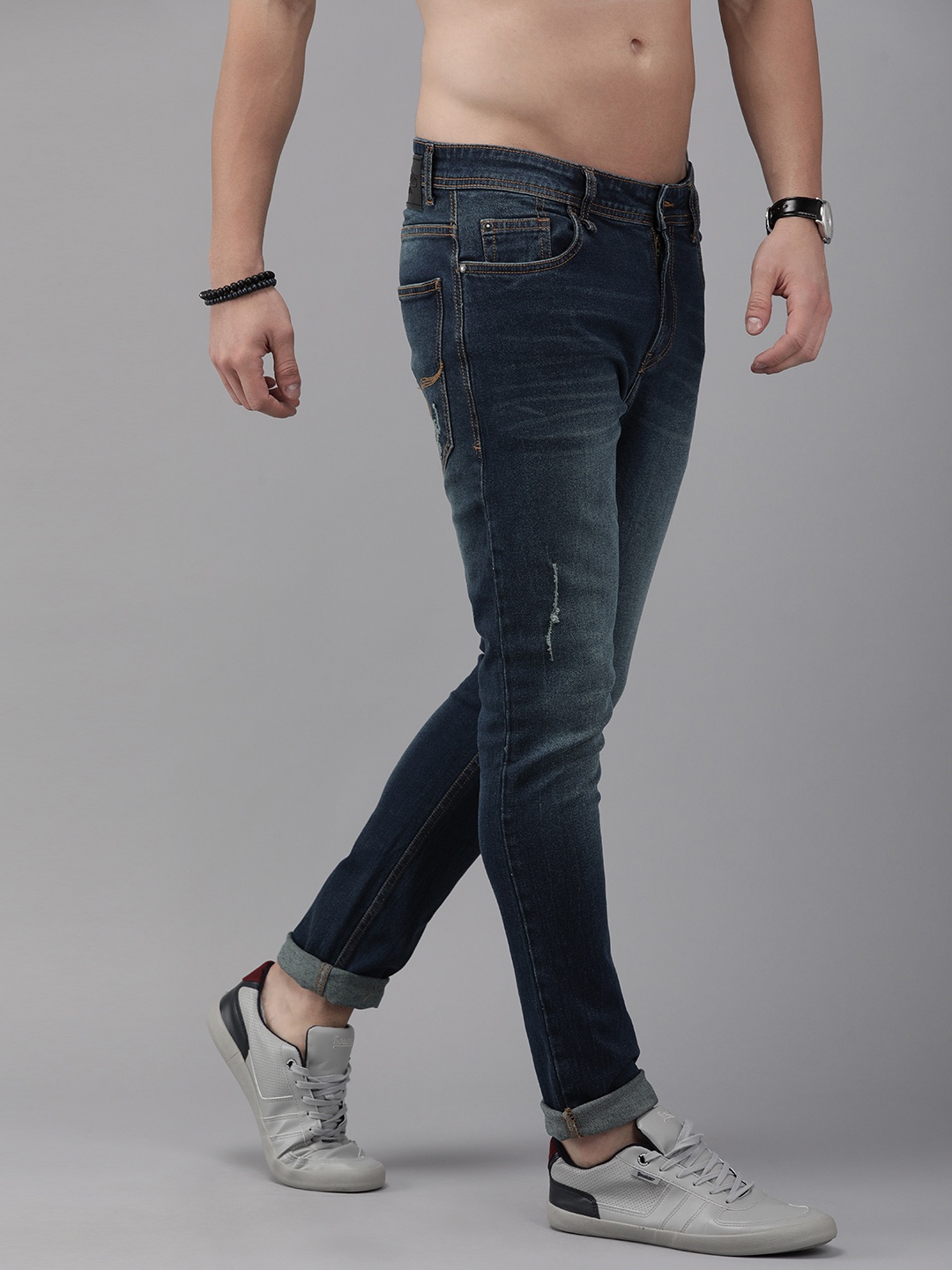 

Roadster Men Blue Skinny Fit Mildly Distressed Light Fade Stretchable Jeans