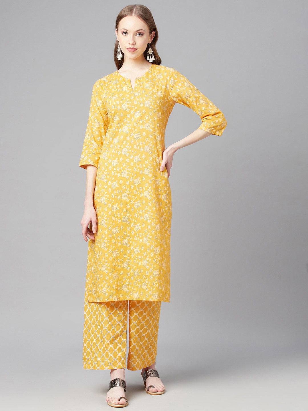 

Poshak Hub Women Yellow & White Pure Cotton Floral Print Kurta with Palazzos
