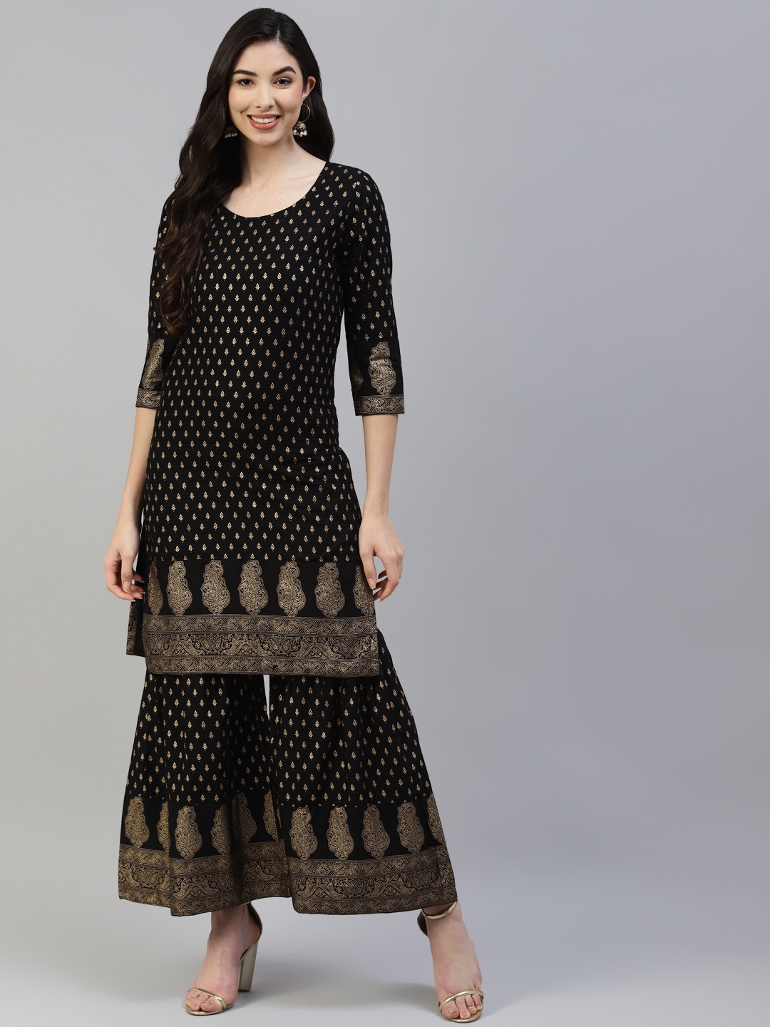 

Poshak Hub Women Black Ethnic Motifs Printed Pure Cotton Kurta with Sharara