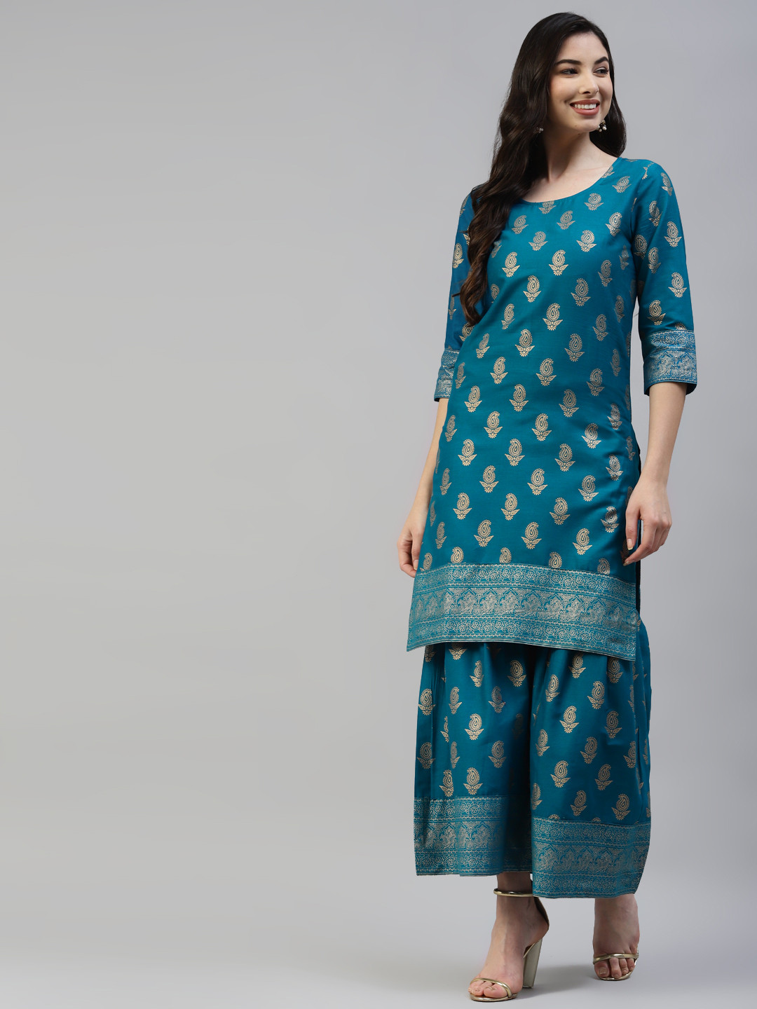 

Poshak Hub Women Turquoise Blue & Gold-Toned Cotton Ethnic Motifs Print Kurta with Sharara