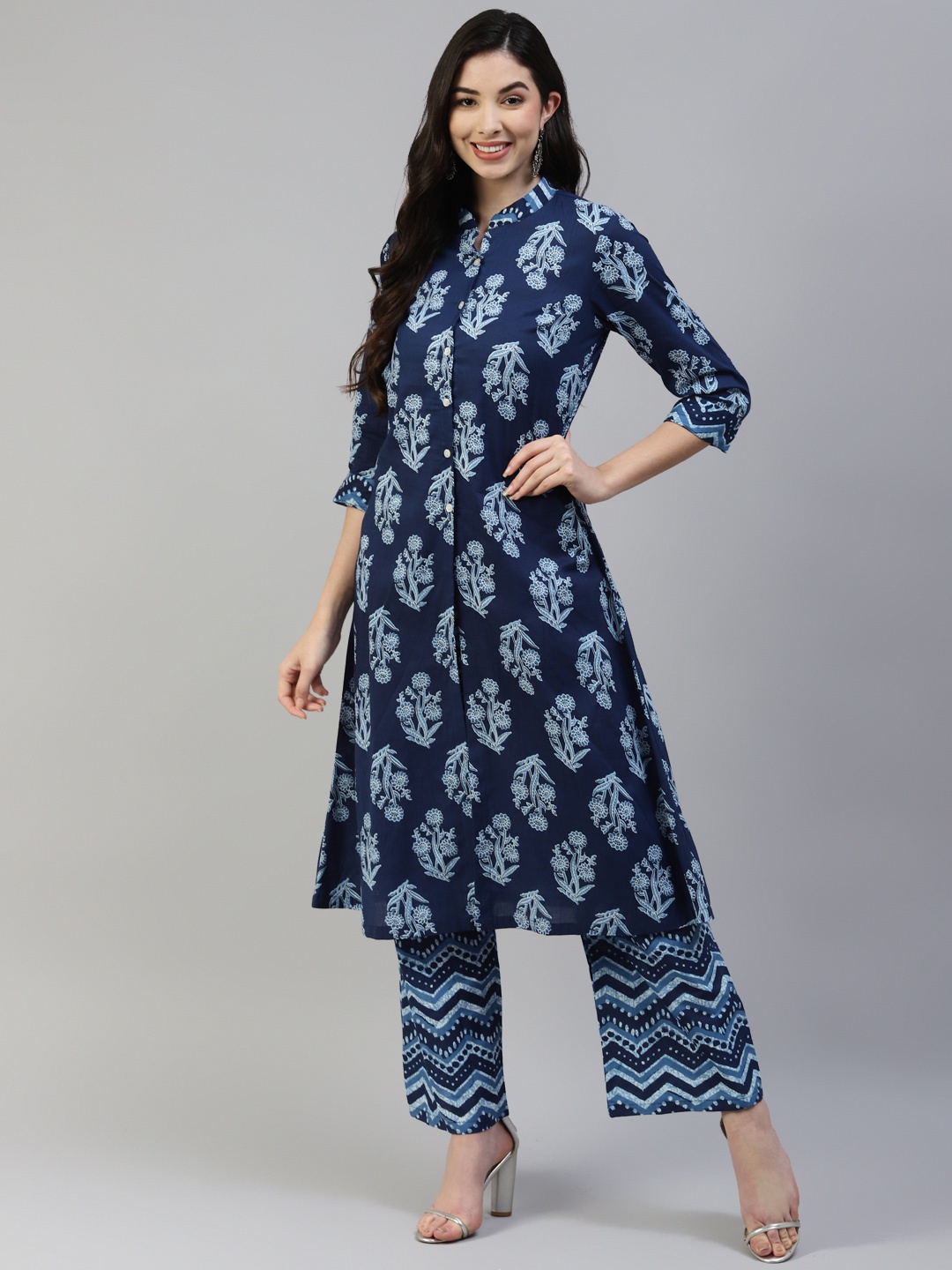 

Poshak Hub Women Blue & White Pure Cotton Floral Print Kurta with Palazzos