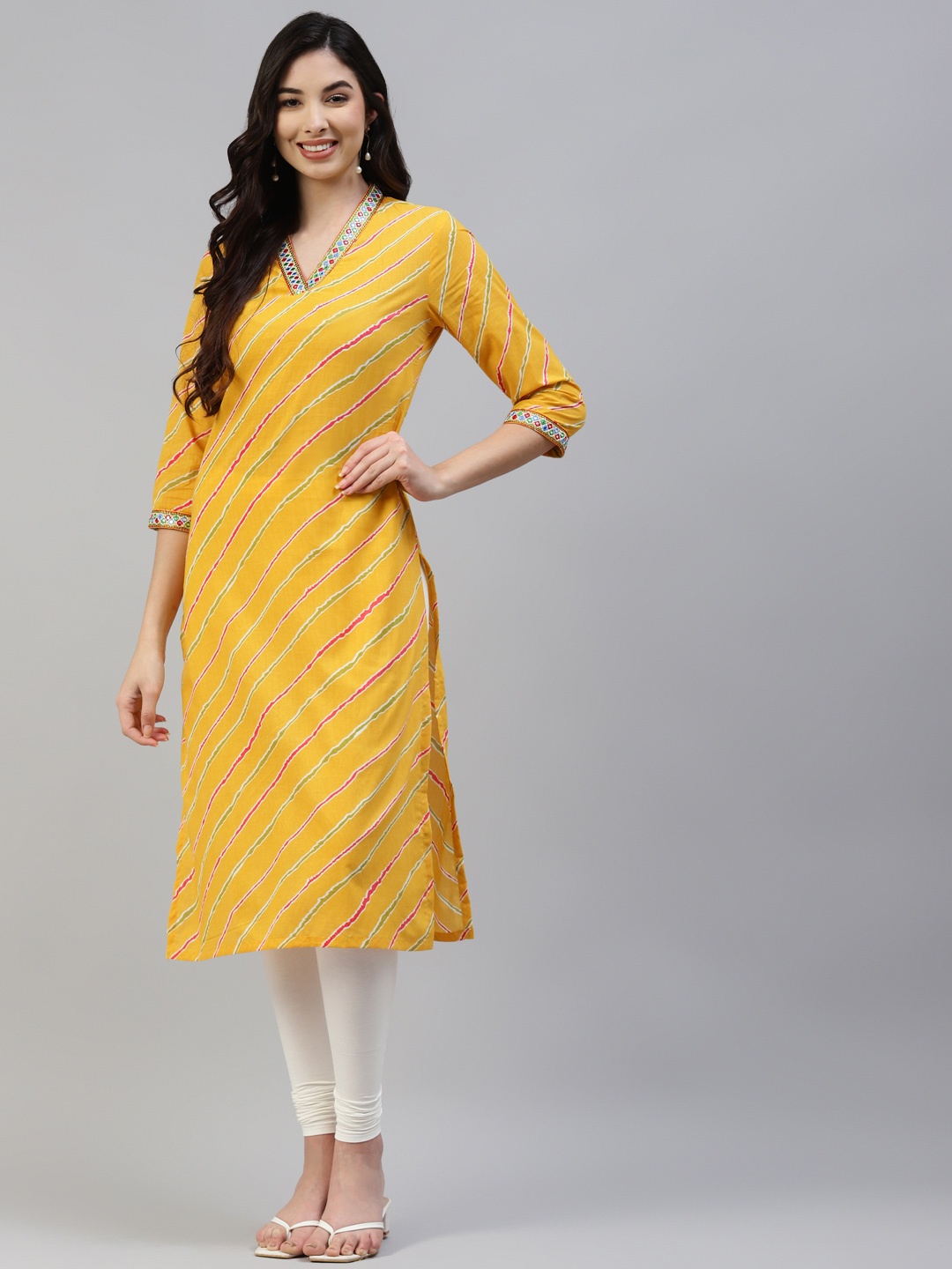 

Poshak Hub Women Yellow & White Pure Cotton Lehriya Print Kurta & Leggings