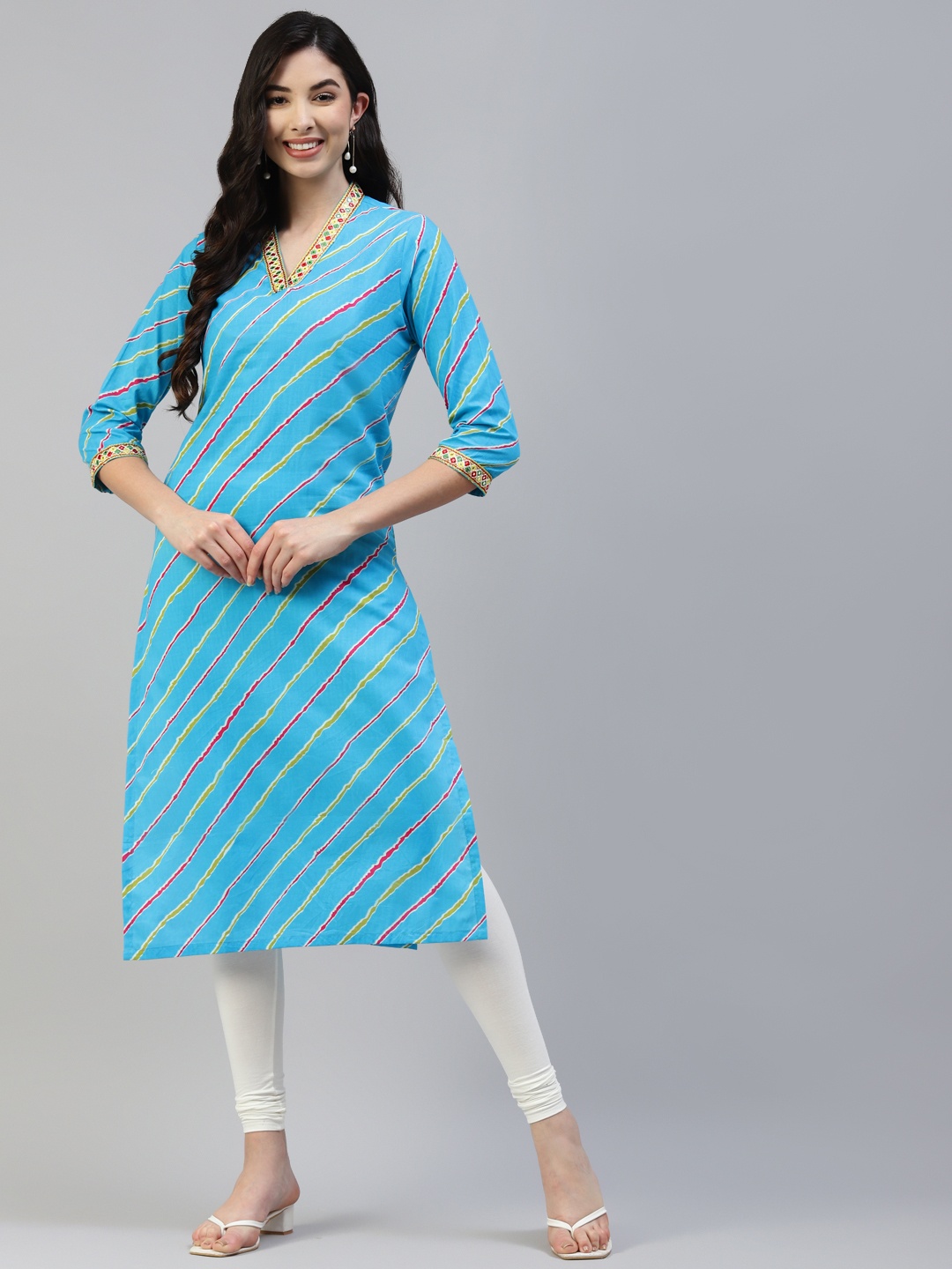 

Poshak Hub Women Blue & White Pure Cotton Lehriya Print Mirror Work Kurta & Leggings