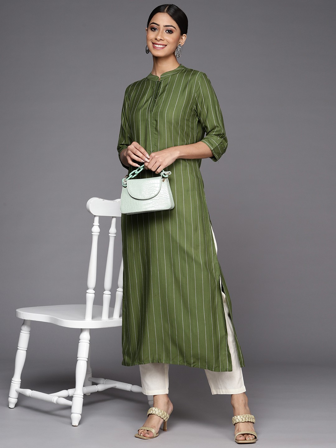

Indo Era Women Green & White Striped Kurta