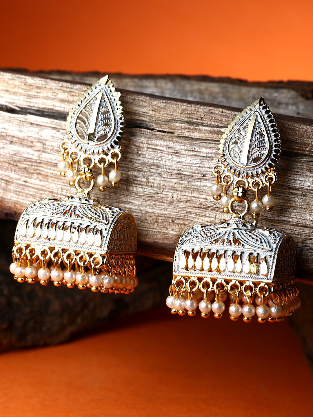 

ANIKAS CREATION Gold Plated & White Contemporary Jhumkas Earrings