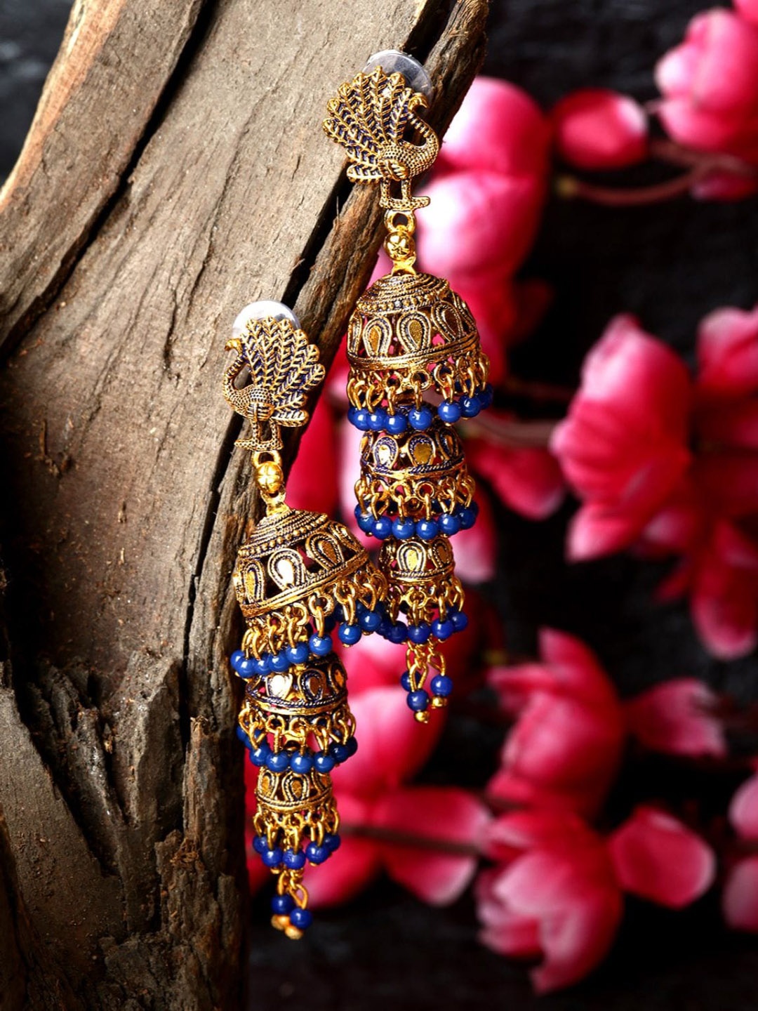 

ANIKAS CREATION Blue Gold Plated Enamelled Peacock Shaped Jhumkas Earrings