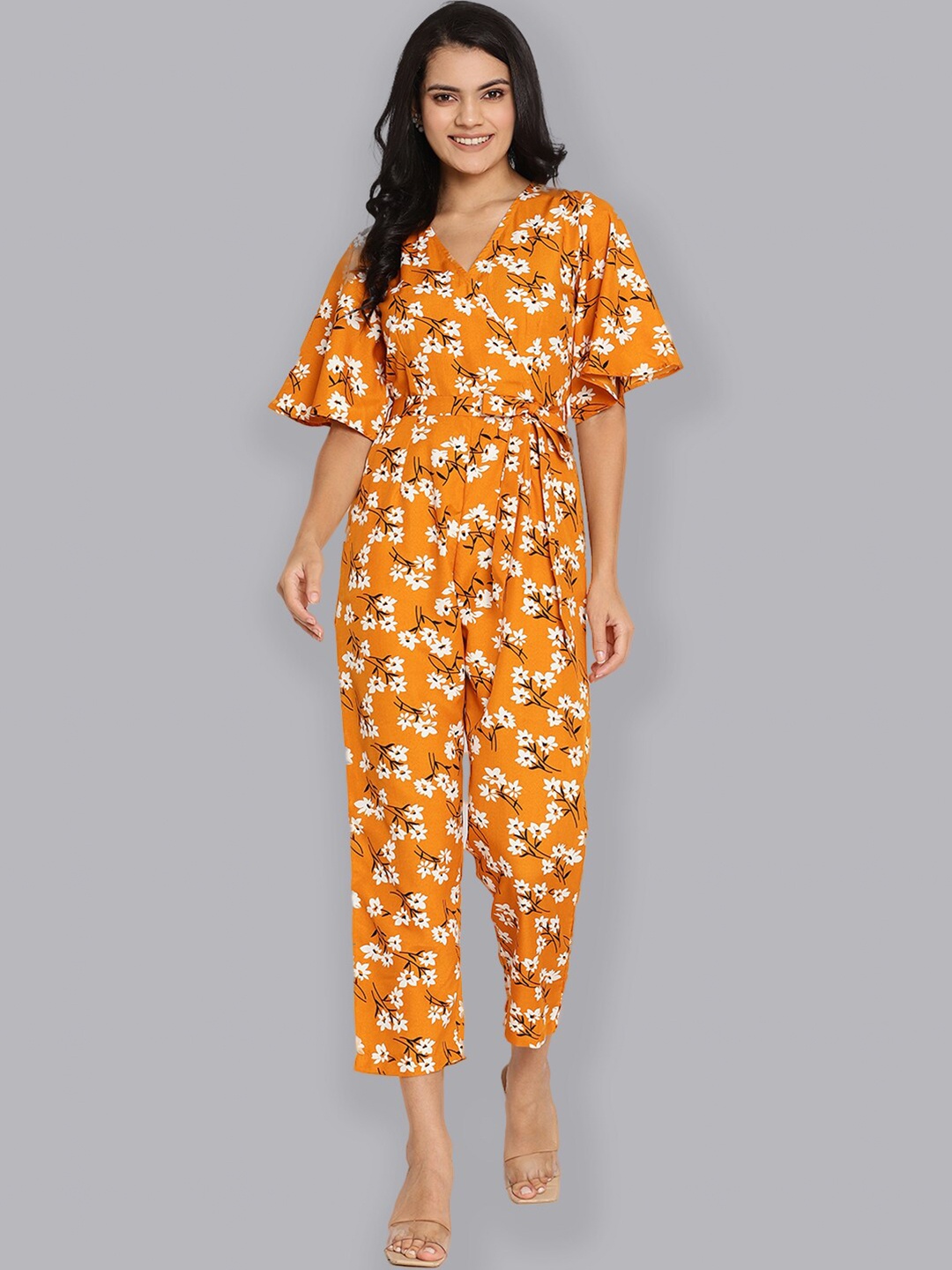 

The Vanca Women Yellow & White Printed Basic Jumpsuit