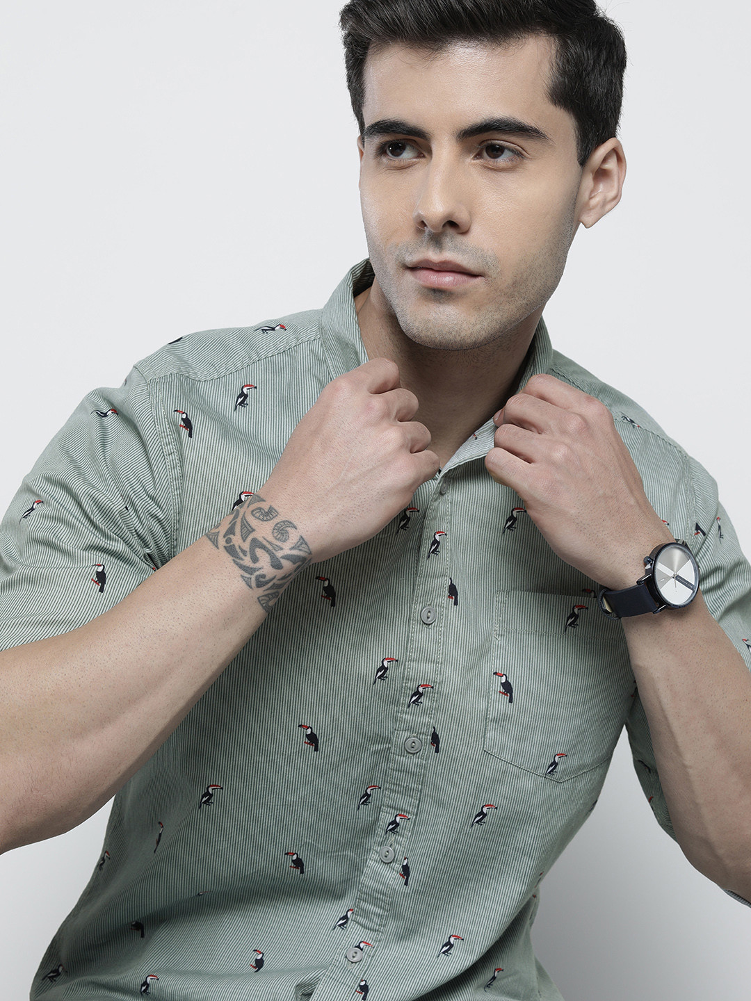 

The Indian Garage Co Men Green & Black Comfort Striped & Toucan Print Cotton Shirt