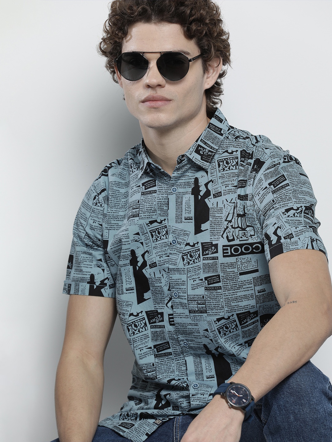 

The Indian Garage Co Men Teal Regular Fit Newspaper Printed Resortwear Shirt
