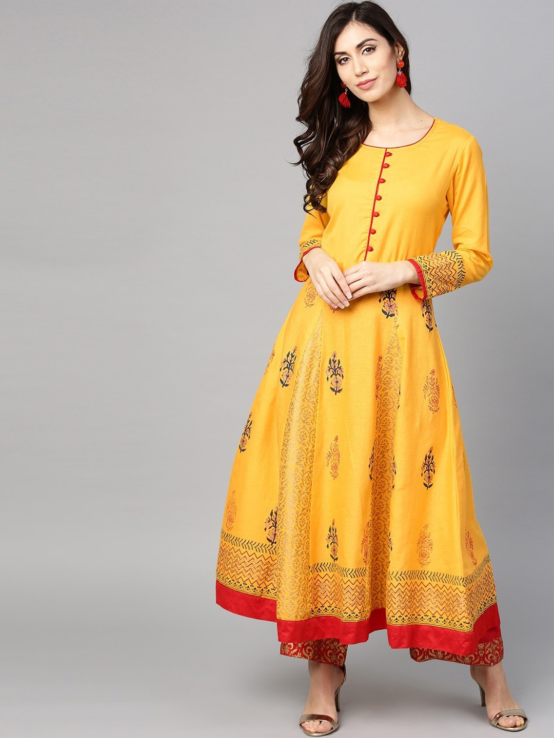 

Tulsattva Women Yellow Ethnic Motifs Printed Thread Work Anarkali Kurta