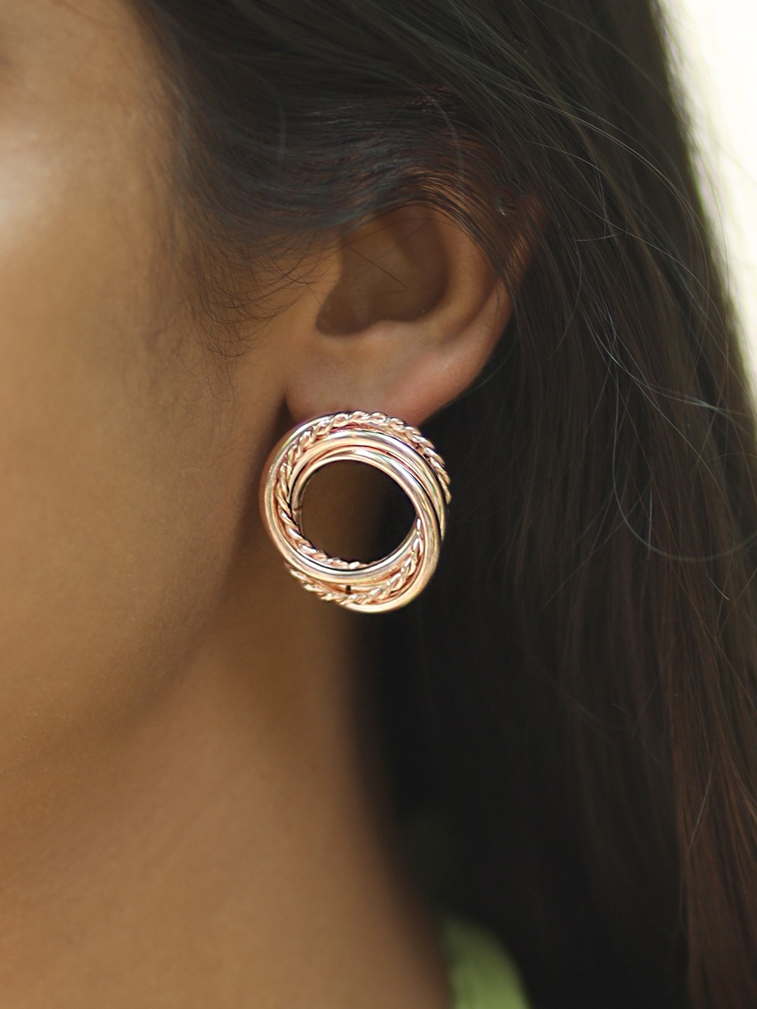 

Ayesha Rose Gold Twisted Braided Circular Oversized Stud Earrings