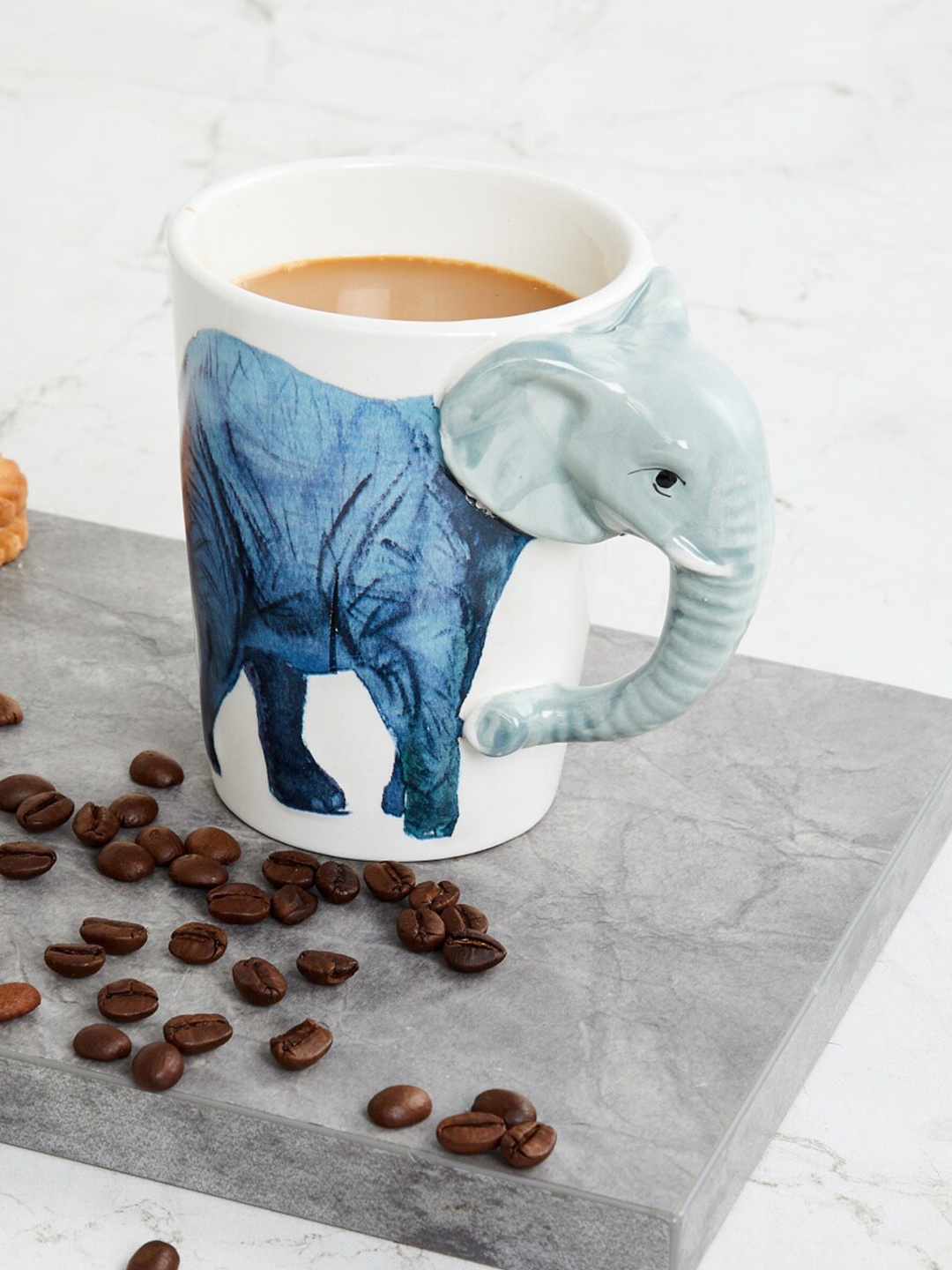 

Home Centre White & Blue Printed Ceramic Glossy Mug