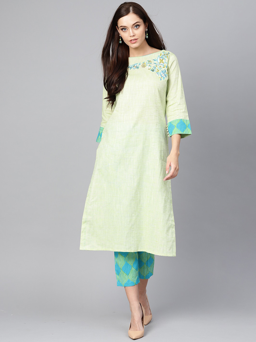 

Indo Era Women Green Yoke Design Thread Work Pure Cotton Kurti with Trousers