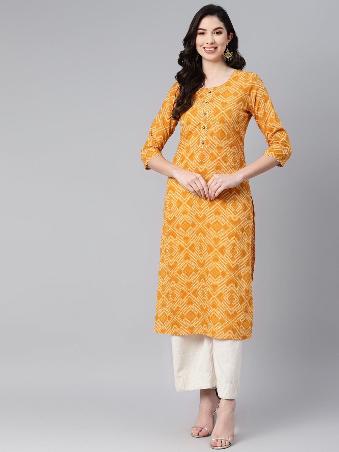

PIROH Women Mustard Yellow & White Bandhani Printed Pure Cotton Gotta Patti Kurta