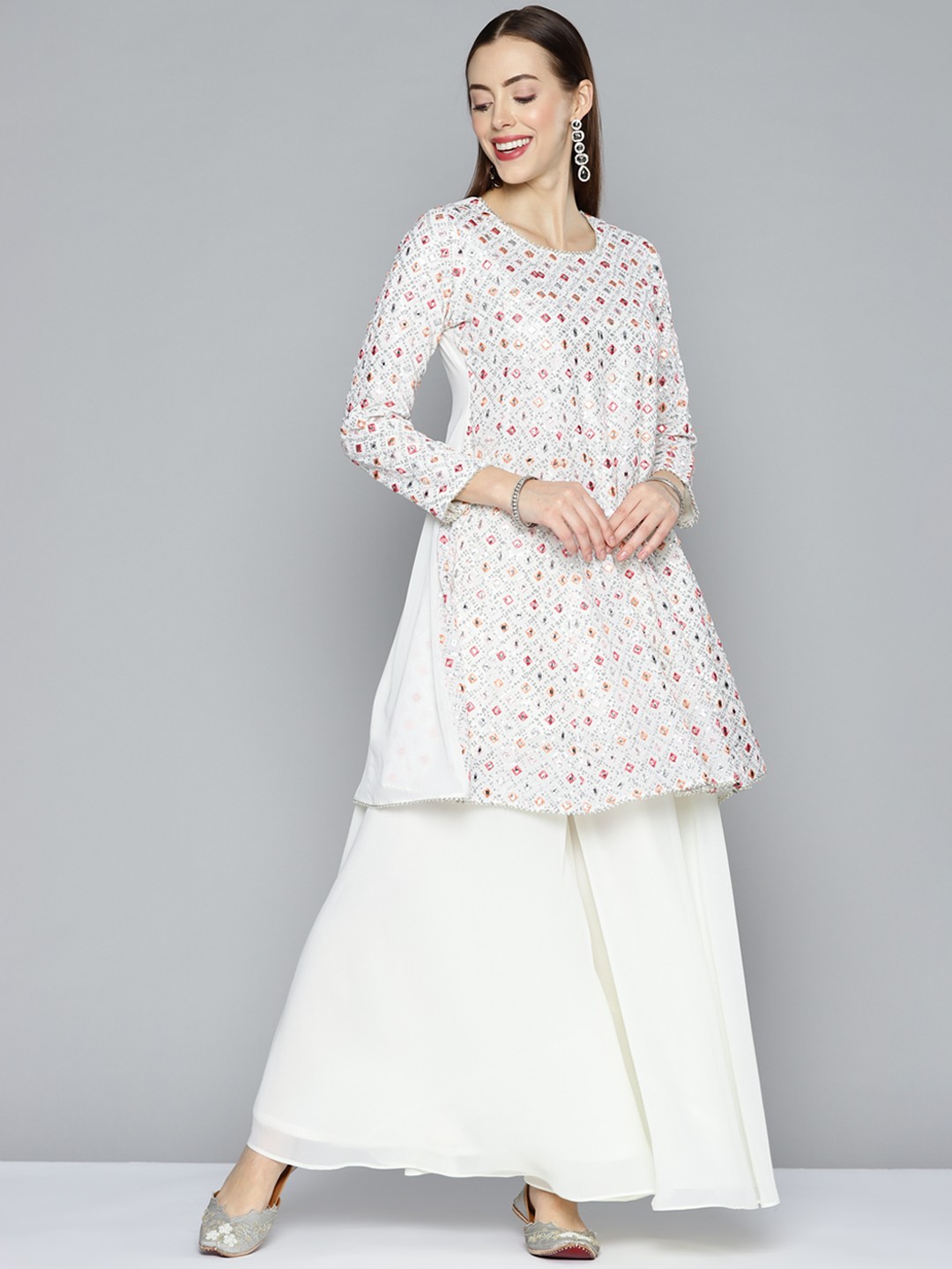 

Kvsfab Women Off White Embroidered Panelled Sequinned Kurta with Palazzos