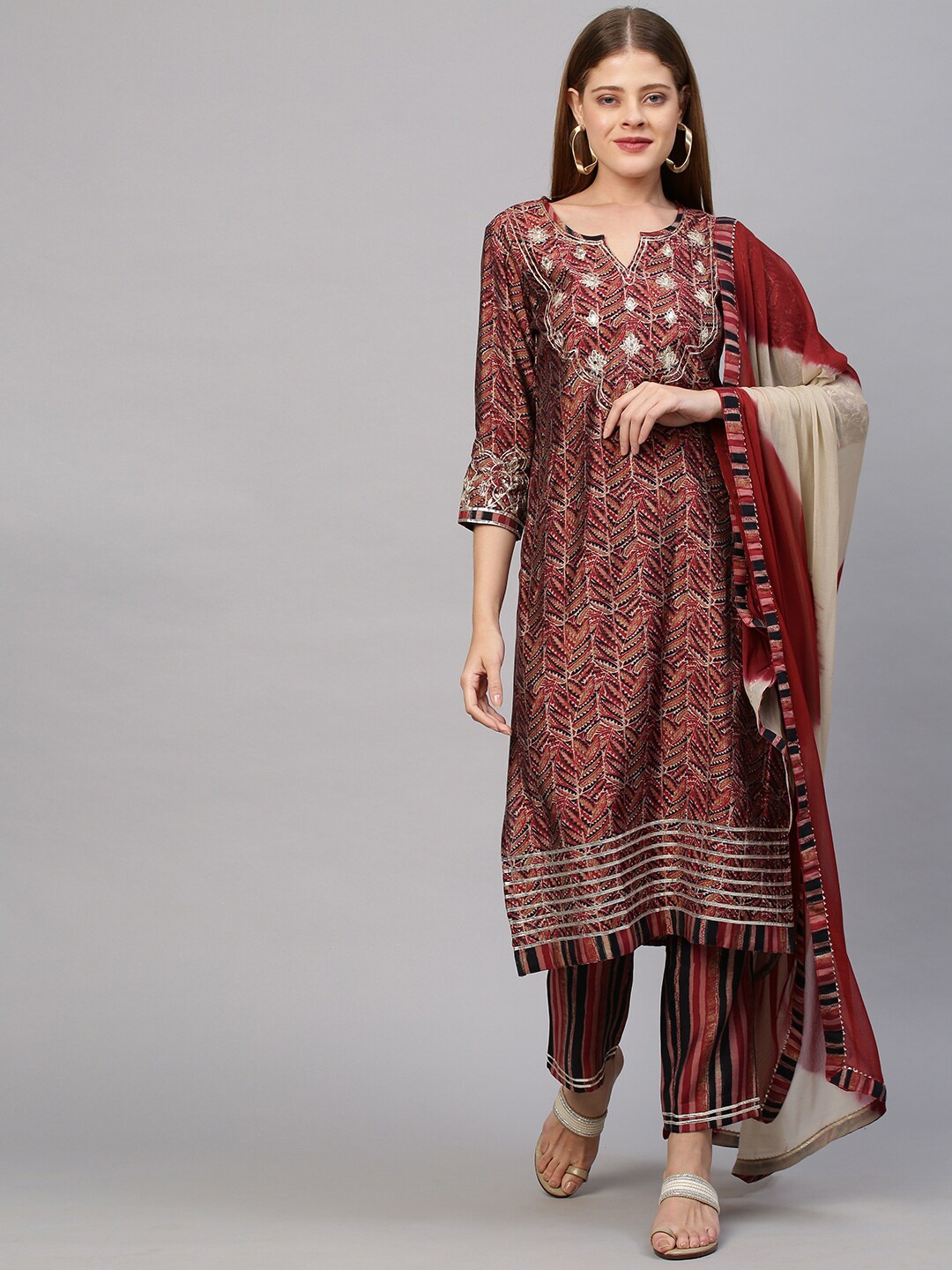 

FASHOR Women Geometric Maroon Printed Kurta with Trousers & Dupatta