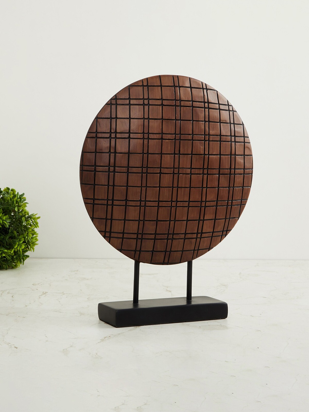 

Home Centre Brown & Black Textured Polyresin Table Accent Showpiece