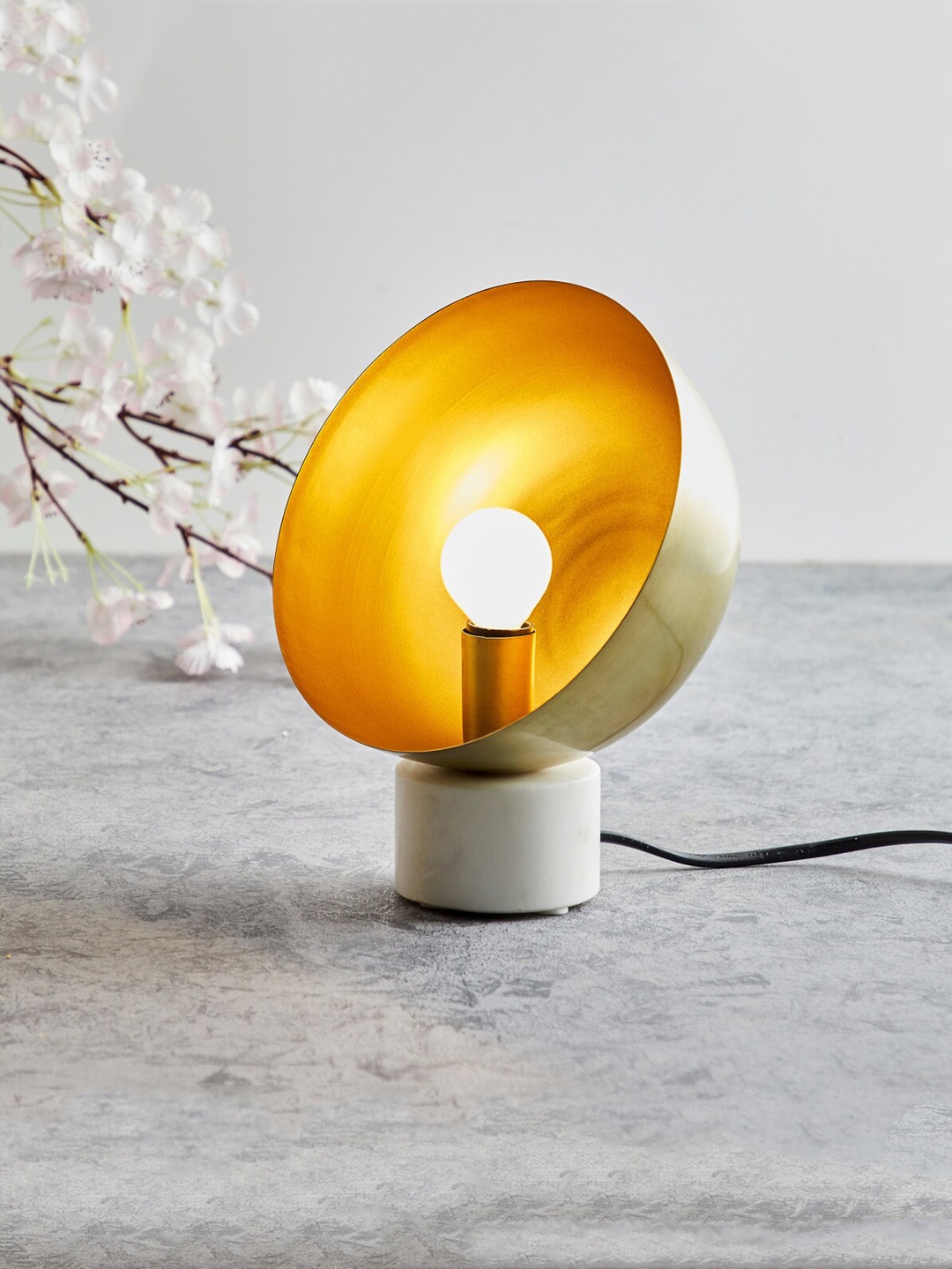 

Home Centre Gold-Toned Solid Round Metal Desk Lamp Showpieces