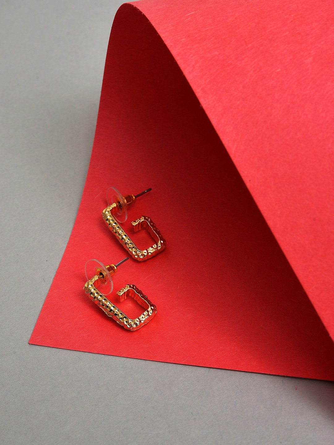 

SOHI Gold-Toned Contemporary Studs Earrings