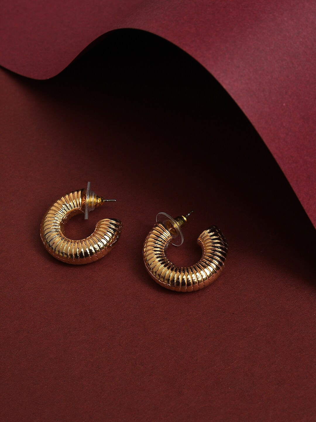 

SOHI Gold-Toned Contemporary Half Hoop Earrings