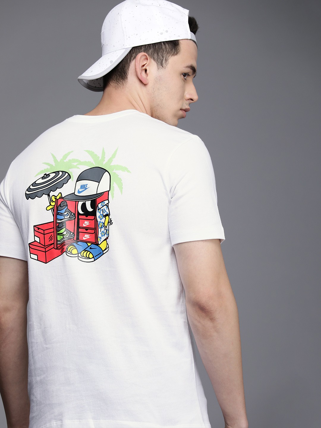 

Nike Men White Graphic Printed Pure Cotton Casual T-shirt