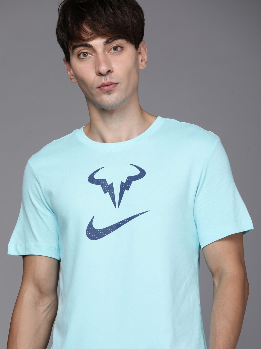 

Nike Men Blue & Navy Blue Brand Logo Printed Tennis T-shirt