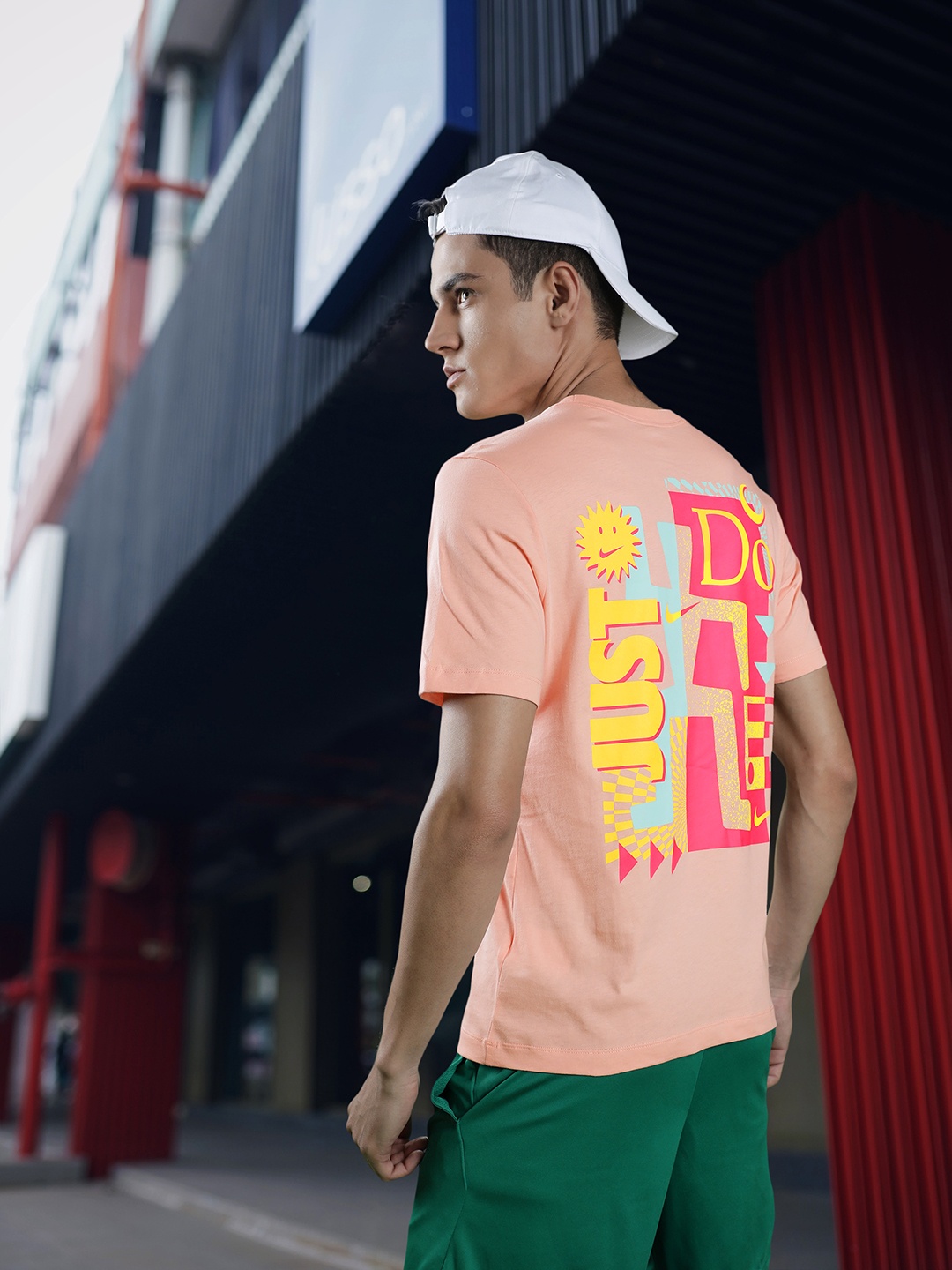 

Nike Men Peach-Coloured Graphic Printed Pure Cotton T-shirt