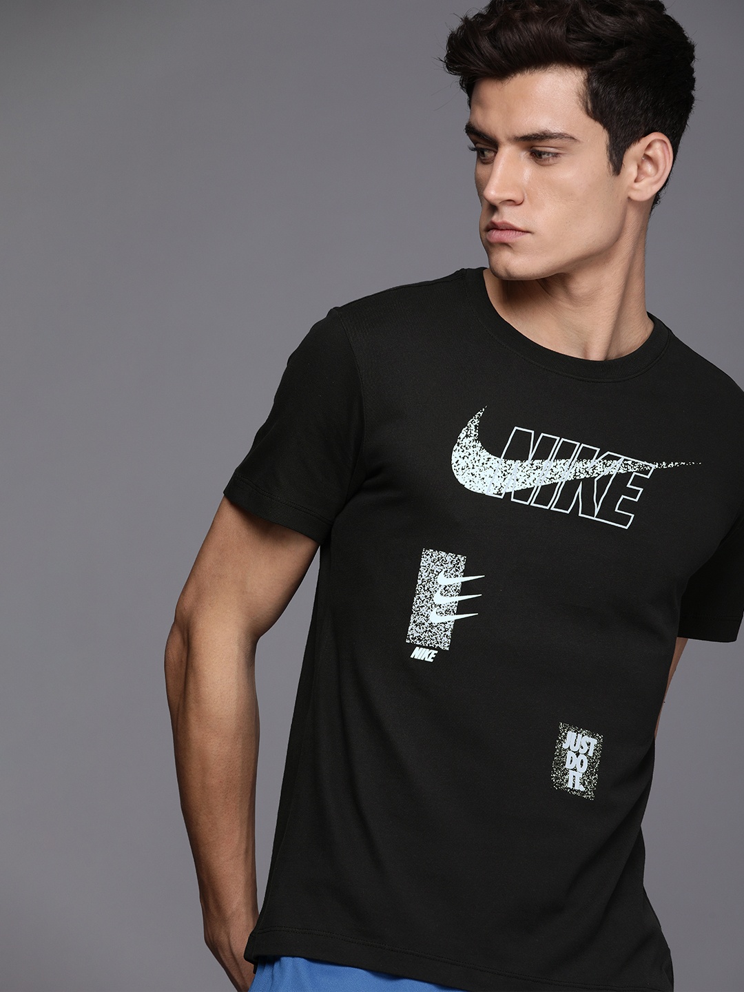 

Nike Men Black Brand Logo Printed Round-Neck T-shirt