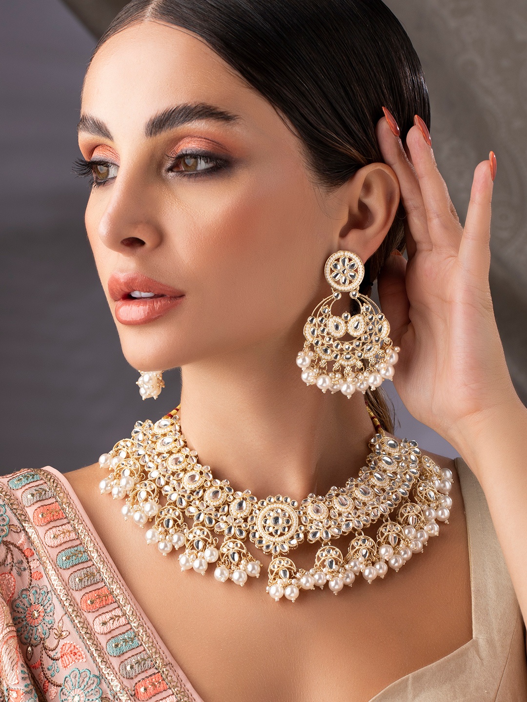 

Rubans Gold-Pleated & White Kundan Studded Pearls Hanging Jewellery Set