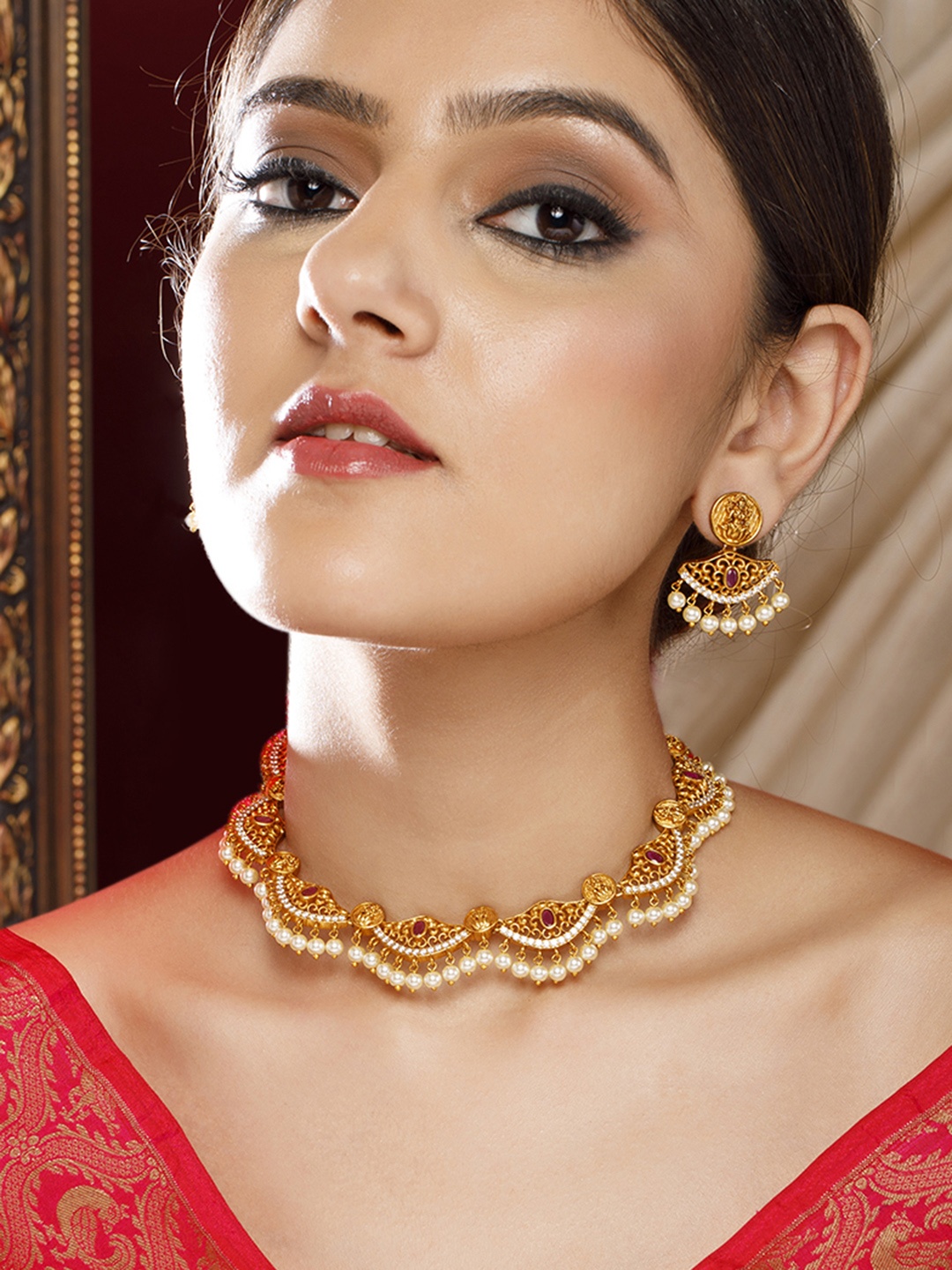 

Rubans 24k Gold-Plated Ruby Pink Kundan-Studded with Pearl Beads Laxmi Motif Jewellery Set