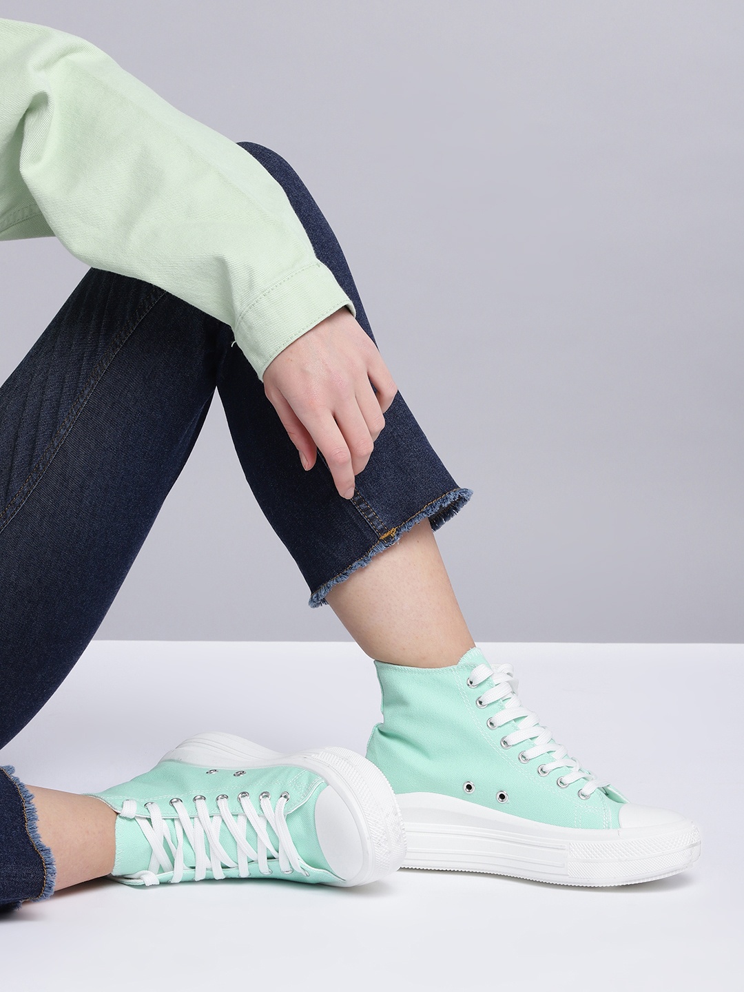 

Kook N Keech Women Mint Green & White Solid Mid-Top Sneakers