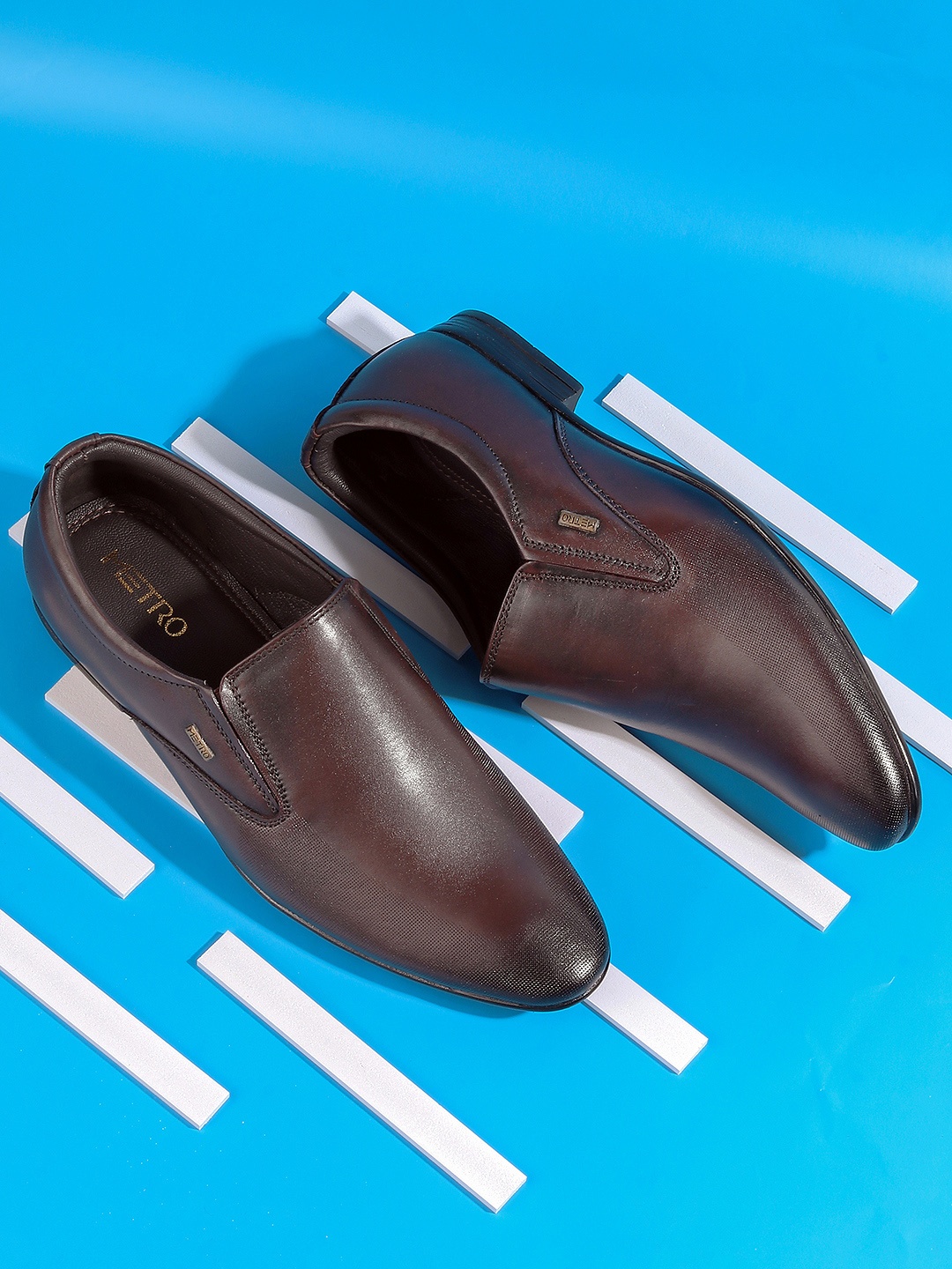 

Mochi Men Maroon Solid Leather Formal Slip on Shoes