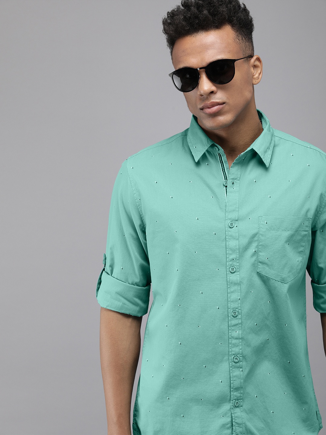 

The Roadster Lifestyle Co Men Turquoise Blue Printed Casual Shirt