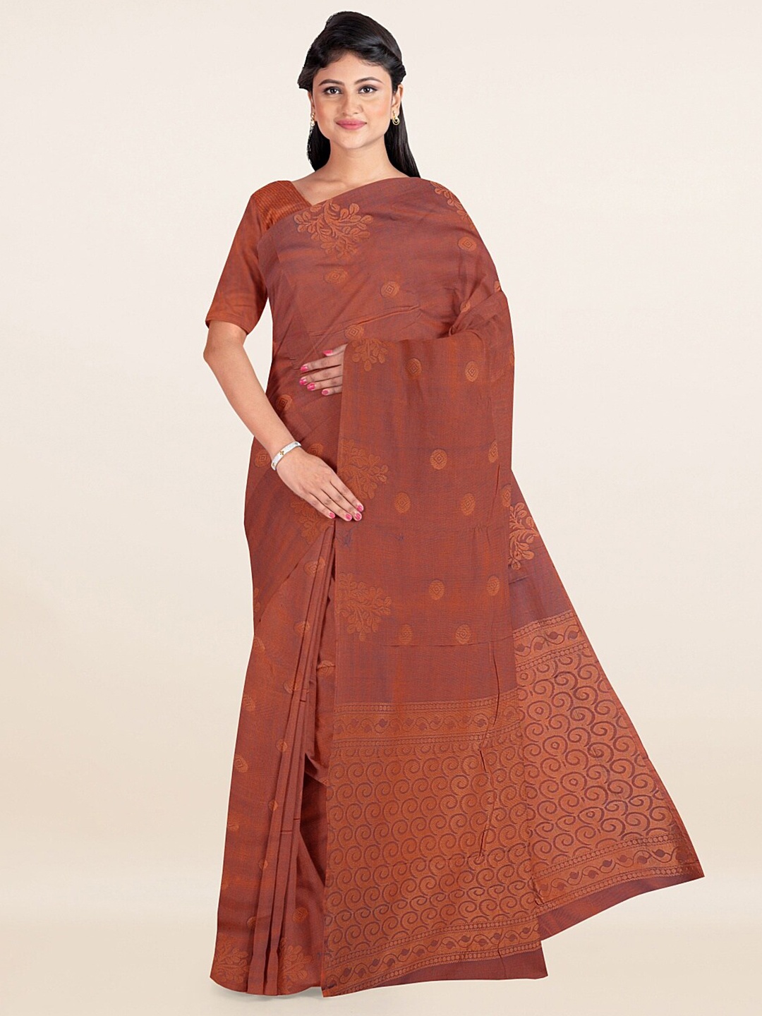 

Pothys Rust Brown & Golden Floral Zari Silk Cotton Saree