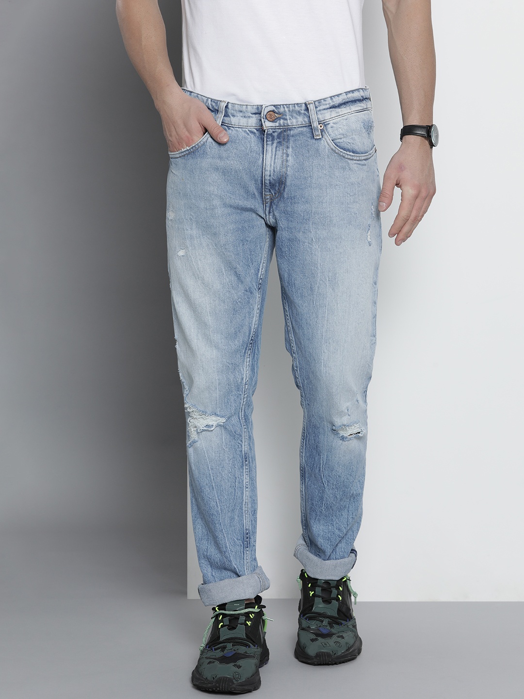 

Tommy Hilfiger Men Blue Slim Fit Heavy Fade Stretchable Casual Jeans