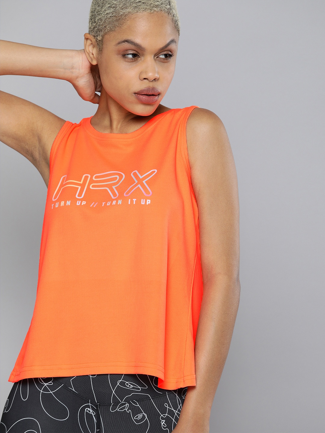 

HRX By Hrithik Roshan Training Women Neon Orange Rapid-Dry Brand Carrier Tops