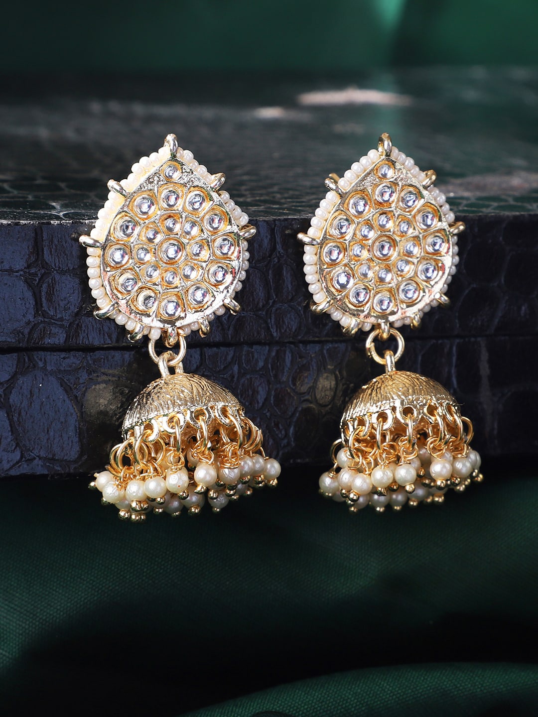 

ANIKAS CREATION Gold Plated & White Jhumkas Earrings